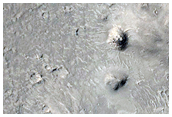 Cratered Cones within a Flow along Cerberus Fossae