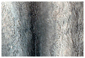 Layered Mesa and Pitted Cones Near Acidalia Mensa