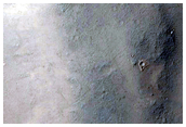 Central Peak Pit Feature of 10-Kilometer Crater