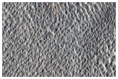 Pit or Crater in Icy Fill Material