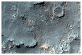 Sinuous Troughs and Ridges Near Sirenum Fossae
