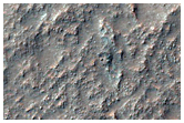 Scour from Channel on Crater Floor on South Rim of Coprates Chasma