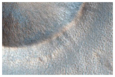Sharp-Rimmed Crater on Northern Plains