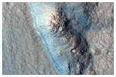 Impact Crater Exposing Bedrock