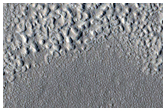 Pits on Aprons of Erebus Montes
