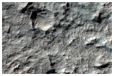 Layered Material on Crater Floor in Terra Sabaea