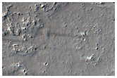 Contact between Olympus Mons Lava Flows and the Surrounding Plains