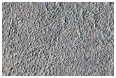 Ir-Bright Crater and Thermally Distinct Unit