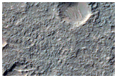 Layering in Collapse Depression Near Hadriaca Patera