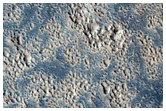 Flow Features in the Phlegra Region