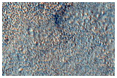 Terrain with Layers and Circular Pits in THEMIS V13028004