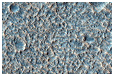 Layering at Peak of Cratered Cone in Chryse Planitia