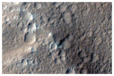 Dark Slope Streak Visible in MOC M21-00123 and E11-00488