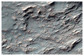 Edge of Fan with Layered Bedrock Exposures