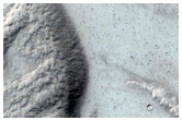 Slope and Fan Features in Tithonium Chasma