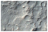 Possible Phyllosilicates on Rim of Magelhaens Crater
