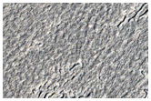 Impact Ejecta Superposed on Mid-Latitude Apron Material