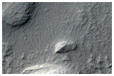 Terraced Mesas in a Noctis Labyrinthus Pit