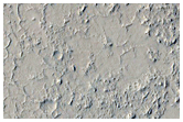 Pits and Channels in Amazonis Planitia