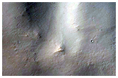 Channel Transversing Crater Ejecta in Arabia Terra