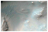 Fresh 5-Kilometer Diameter Crater Near Ophir Catenae