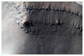 Rampart Crater Ejecta Exposed in Cross-Section