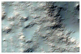 Possible Olivine-Rich Terrain North of Hellas Region