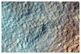 Candidate New Impact Site Formed between Dec 2007 and Dec 2011