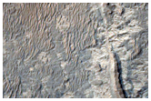 Crater Cutting Ridge-Forming Unit Visible in CTX Image B18_016578_1822