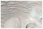 Fans in 10-Kilometer Diameter Crater North of Mojave Crater