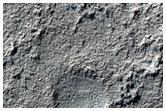 Filled Crater Near Head of Reull Vallis