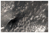 Stratigraphy of Claritas Fossae Scarp