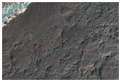 Light-Toned Sediments Exposed within Ladon Valles