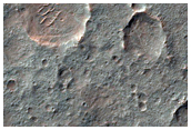 Southern Rim of Possible Olivine-Rich Depression in Noachis Terra