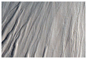 Mass Movement on Wall of Crater in Lyot Crater Ejecta Blanket