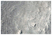 Possible Layered Deposit in Open Basin