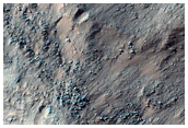 Chaos and Outflow Channel Floor Transition in Osuga Valles