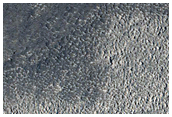 Dark Flowlike Feature in CTX Image G17_024700_2124_XN_32N350W
