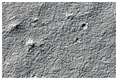 Layered Structures in Hellas Montes Region
