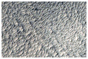 Central Peak Crater Superposed on Larger Crater Rim