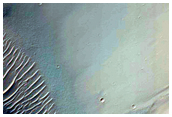 Light-Toned Rock Exposure in Crater Wall