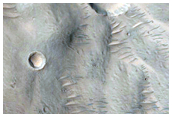 Fans in 10-Kilometer Diameter Crater North of Mojave Crater