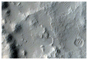 Streamlined Landforms Around a Crater in Marte Vallis