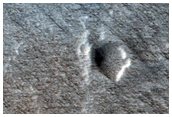 Possible Aeolian Bedforms in Ascraeus Mons Caldera