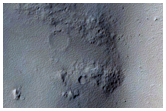 Terraces Cut Into Crater Ejecta Deposit