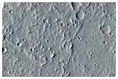Small Shield in Tharsis Region Embayed by Younger Lavas