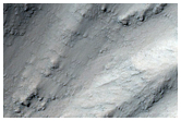 Cut Crater along Edge of Candor Chasma