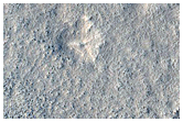 Candidate New Impact Site with Possible Ice Exposure