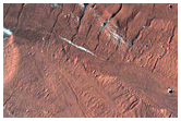 Monitor Steep Slopes of Asimov Crater