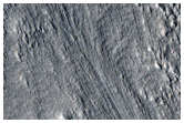 Curved Ridges at Base of Mesa in Protonilus Mensae